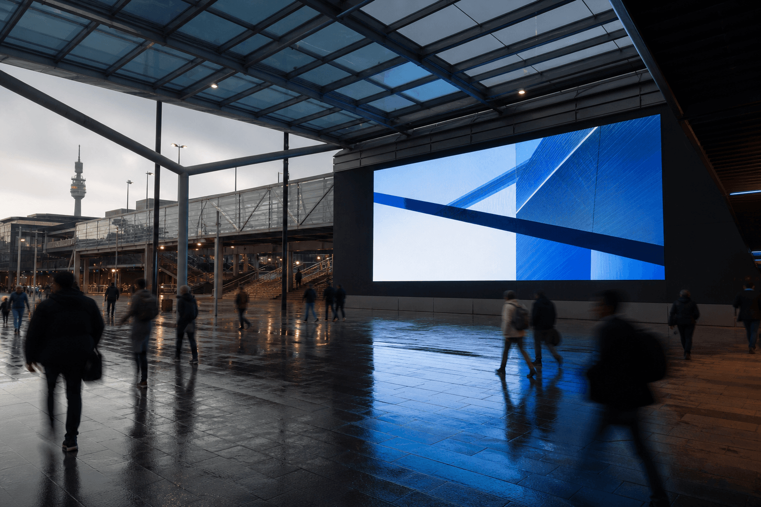 Weatherproof LED display in a modern Johannesburg transport concourse after rain